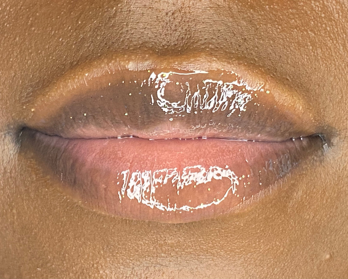 Peppermint flavored lip gloss swatch